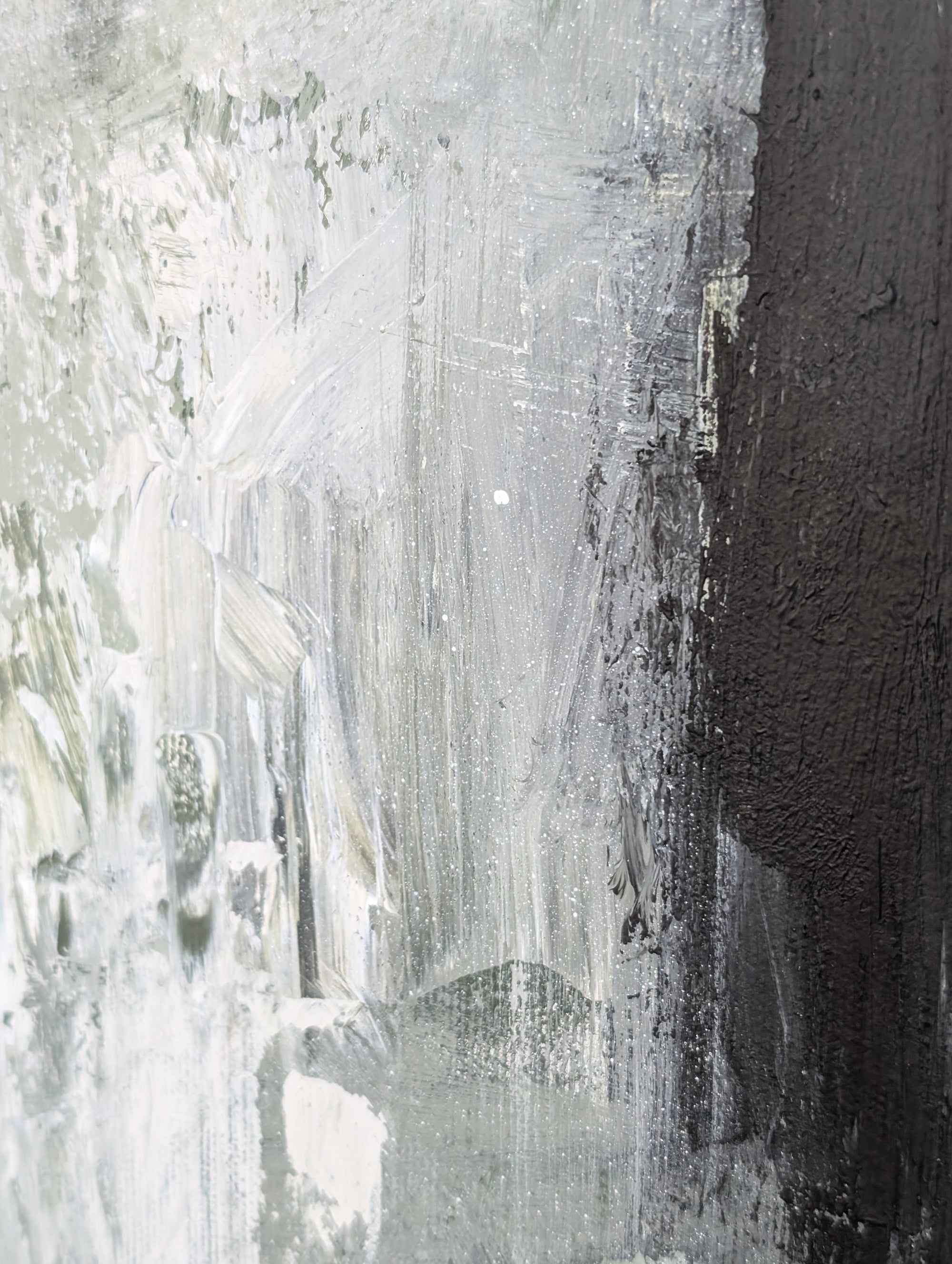 The image is an abstract painting with a mix of white and black colors, creating a sense of depth and texture. The painting appears to be a collage of multiple images, with the black and white color scheme adding a dramatic effect to the overall composition.