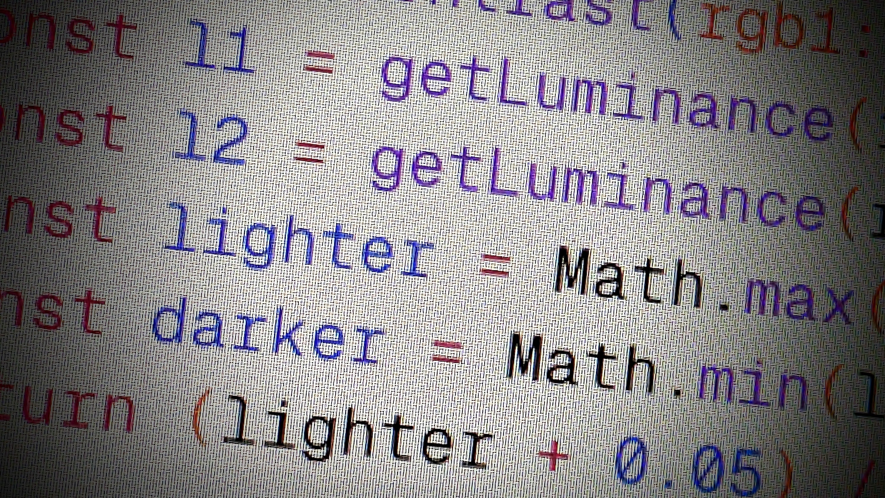 Close-up of code with variables and mathematical functions on a computer screen. Generative coding for pen plotter art.